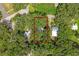 Aerial view of property and surrounding neighborhood at 104 E Mcclendon St, Lady Lake, FL 32159
