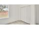Spacious bedroom with large closet and vinyl plank flooring at 3137 Sw 127Th Lane Rd, Ocala, FL 34473