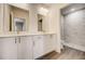 Modern bathroom with double vanity and a separate shower at 1308 Hillsborough Ct, Kissimmee, FL 34759