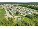 Aerial view of a house in a residential area at 1308 Hillsborough Ct, Kissimmee, FL 34759