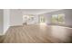 Open concept living area with kitchen and sliding glass doors at 1308 Hillsborough Ct, Kissimmee, FL 34759