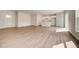 Spacious living room with an open floor plan and wood-look flooring at 1308 Hillsborough Ct, Kissimmee, FL 34759