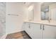 Elegant bathroom with double vanity and marble shower at 1308 Hillsborough Ct, Kissimmee, FL 34759