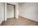 Spacious bedroom with vinyl flooring and a double door closet at 1308 Hillsborough Ct, Kissimmee, FL 34759