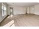 Sunlit living room with hardwood floors and neutral colors at 1308 Hillsborough Ct, Kissimmee, FL 34759