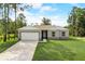 Newly constructed home with a two-car garage at 1308 Hillsborough Ct, Kissimmee, FL 34759