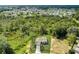 Aerial view of a house in a quiet neighborhood at 1308 Hillsborough Ct, Kissimmee, FL 34759