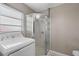 Bright bathroom with shower stall, toilet and vanity at 106 Oregon Ave, Saint Cloud, FL 34769