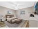 Spacious bedroom with large bed, and plenty of natural light at 106 Oregon Ave, Saint Cloud, FL 34769
