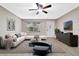 Bright living room with comfortable seating and a large window at 106 Oregon Ave, Saint Cloud, FL 34769