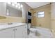 Clean bathroom, featuring a bathtub and a white vanity at 106 Oregon Ave, Saint Cloud, FL 34769