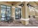 Outdoor cafe seating area with adjacent shops at 12556 Floridays Resort Dr # 207-A, Orlando, FL 32821