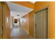 Clean and well-maintained hallway with apartment access at 12556 Floridays Resort Dr # 207-A, Orlando, FL 32821