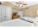 Bedroom with two double beds and a dresser at 12556 Floridays Resort Dr # 207-A, Orlando, FL 32821