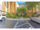 Convenient building entrance with parking and landscaping at 12556 Floridays Resort Dr # 207-A, Orlando, FL 32821