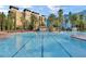 Large resort-style pool with ample lounge chairs at 12556 Floridays Resort Dr # 207-A, Orlando, FL 32821