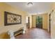 Well-lit lobby with elevator access and seating at 12556 Floridays Resort Dr # 207-A, Orlando, FL 32821