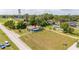 Aerial view of single Gathering home and lot at 168 E Sunset St, Groveland, FL 34736