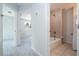 Updated bathroom with a bathtub and new vanity at 168 E Sunset St, Groveland, FL 34736