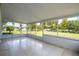 View from screened porch overlooking backyard at 168 E Sunset St, Groveland, FL 34736