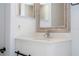 Close up of the stylish bathroom vanity at 168 E Sunset St, Groveland, FL 34736