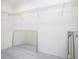 Large walk-in closet with wire shelving and mirrored doors at 168 E Sunset St, Groveland, FL 34736
