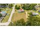 Property view showing house and large lot at 168 E Sunset St, Groveland, FL 34736