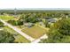 Aerial view of single Gathering home and lot at 168 E Sunset St, Groveland, FL 34736