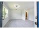 Bright living room with gray vinyl flooring at 168 E Sunset St, Groveland, FL 34736