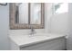 Modern bathroom vanity with a white countertop and a chrome faucet at 168 E Sunset St, Groveland, FL 34736