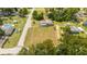 Property view showing house and large lot at 168 E Sunset St, Groveland, FL 34736