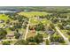 Wide shot of property and surrounding area at 168 E Sunset St, Groveland, FL 34736