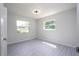 Bright bedroom with new flooring and windows at 168 E Sunset St, Groveland, FL 34736