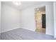 Dining area with wood-look flooring and view to kitchen at 168 E Sunset St, Groveland, FL 34736