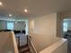 Upstairs hallway offering views of the living room and bedrooms at 2346 Upland Ln, Apopka, FL 32712