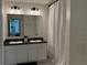Bathroom with double sinks, vanity, and shower at 2346 Upland Ln, Apopka, FL 32712