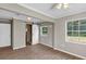 Spacious bedroom with wood flooring and barn door at 5311 Shady Oak N Dr, Lakeland, FL 33810