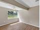 Bright bedroom with wood flooring and large window at 5311 Shady Oak N Dr, Lakeland, FL 33810