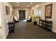 Lobby with comfortable seating and dark wood furniture at 571 Saint Andrews Rd, Winter Haven, FL 33884