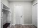 Convenient drop zone with built-in bench and storage at 3198 Sailing Pier Ave, Winter Garden, FL 34787