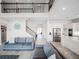 Open living room with high ceilings and views of the kitchen at 3198 Sailing Pier Ave, Winter Garden, FL 34787