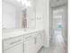 Clean bathroom with white vanity and updated fixtures at 3198 Sailing Pier Ave, Winter Garden, FL 34787