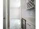 Modern kitchen with a wine fridge and white shaker cabinets at 3198 Sailing Pier Ave, Winter Garden, FL 34787