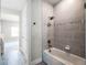 Modern bathroom with a shower/tub combo and neutral colors at 3198 Sailing Pier Ave, Winter Garden, FL 34787