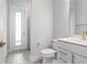 Clean bathroom with a walk-in shower and modern vanity at 3198 Sailing Pier Ave, Winter Garden, FL 34787
