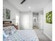 Spacious bedroom with a king-size bed and calming decor at 3198 Sailing Pier Ave, Winter Garden, FL 34787
