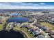 Stunning aerial view of the community and surrounding landscape at 3198 Sailing Pier Ave, Winter Garden, FL 34787