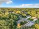 Aerial view showing house and surrounding area at 1628 S Grove St, Eustis, FL 32726