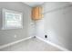 Laundry room with overhead cabinets and shelving at 1628 S Grove St, Eustis, FL 32726