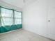 Sunroom with green curtains and tile flooring at 1628 S Grove St, Eustis, FL 32726